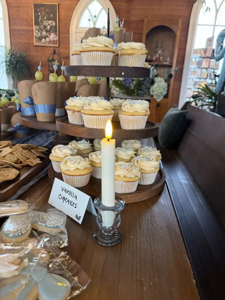Tiered cupcake display with a candle at an O'Kelly Chapel reception